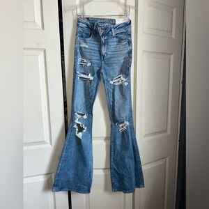 Super hi-rise jeans flare crossover